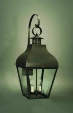 Northeast Lantern 7647-AB-LT2-CLR - Curved Top Wall With Top Scroll Antique Brass 2 Candelabra Sockets Clear Glass
